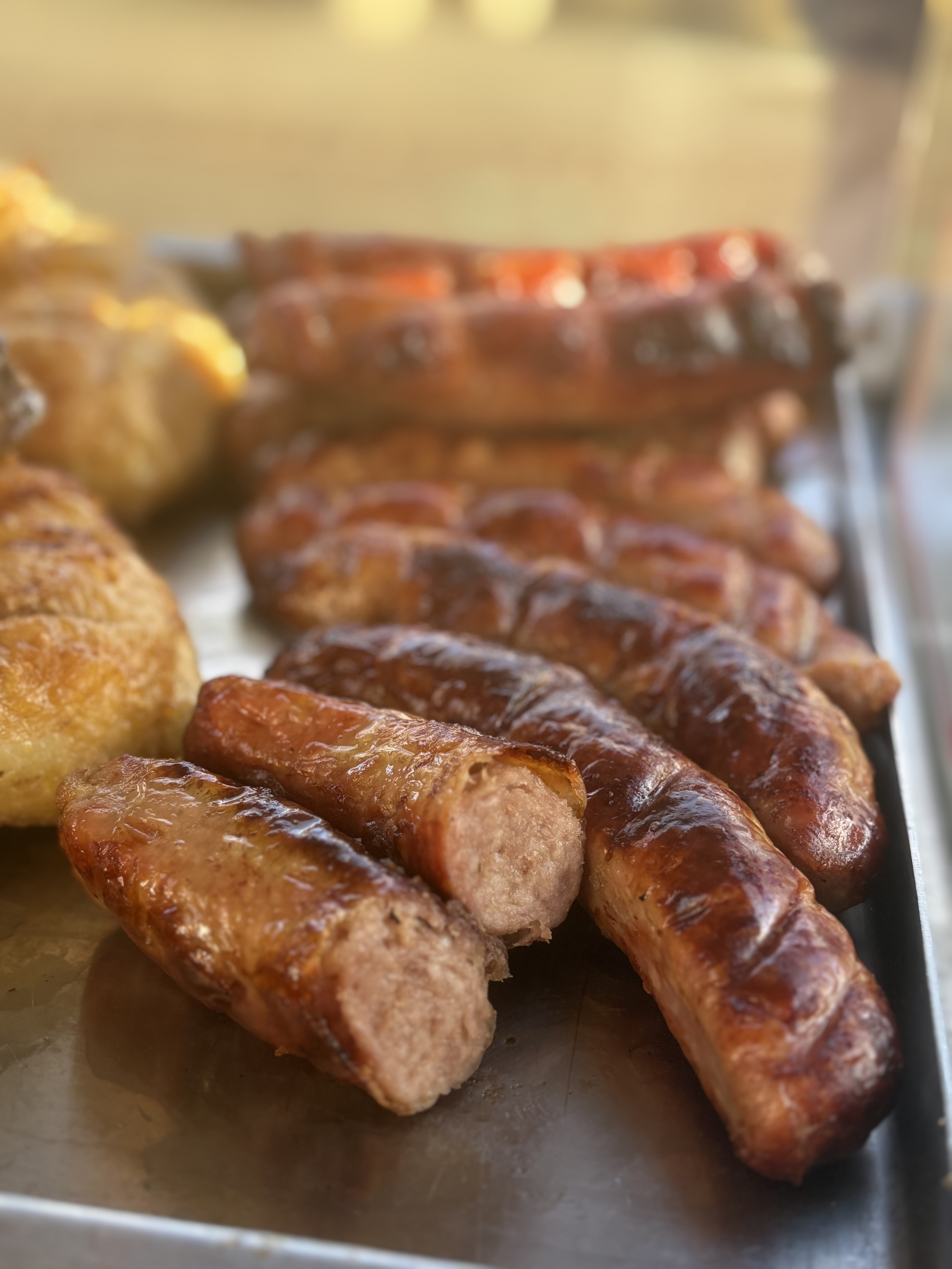 Saucisses de Toulouse dorées à la rôtissoire